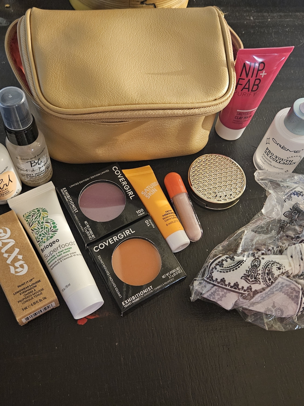 Estee Lauder Yellow Travel Cosmetic Bag with Assorted Makeup